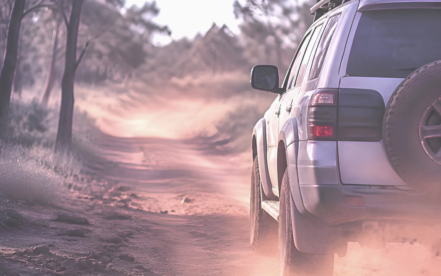 Four wheel drive on a red dirt track