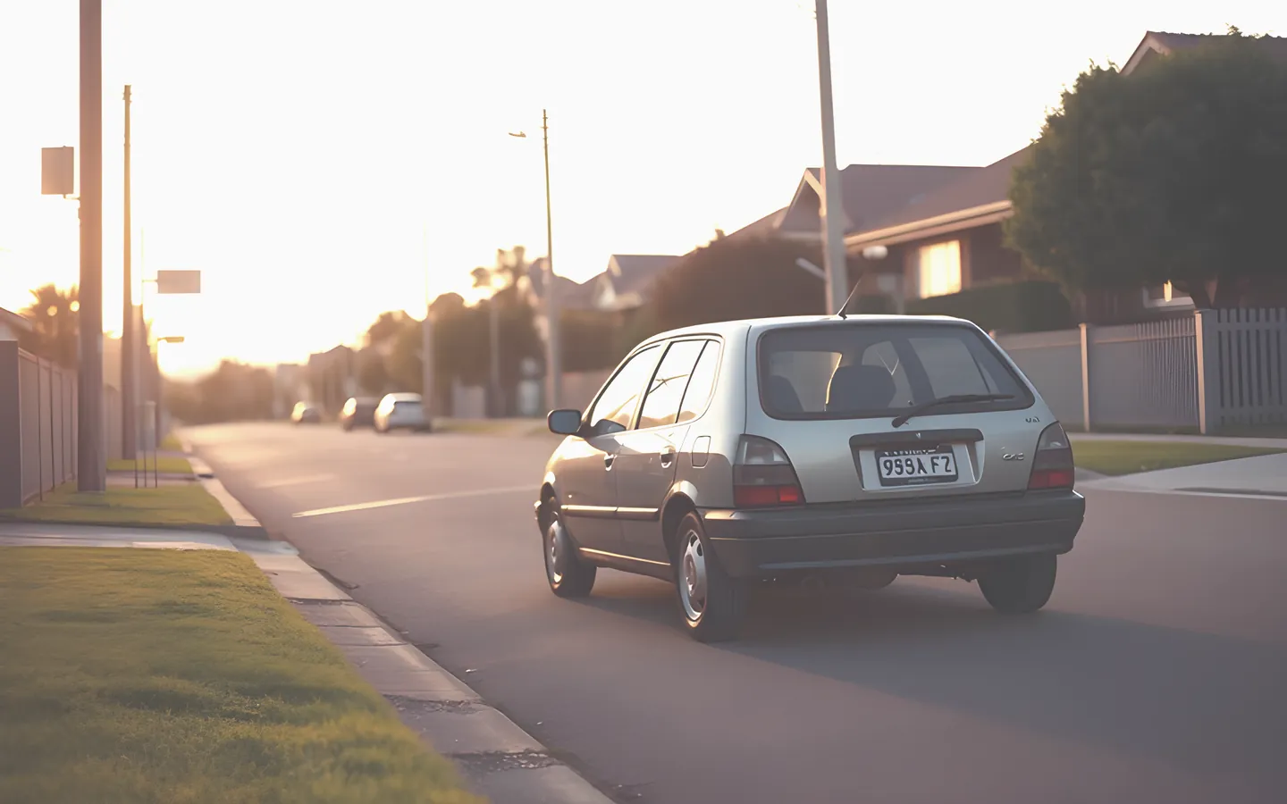 Small used hatchback parked on a suburban Australian street