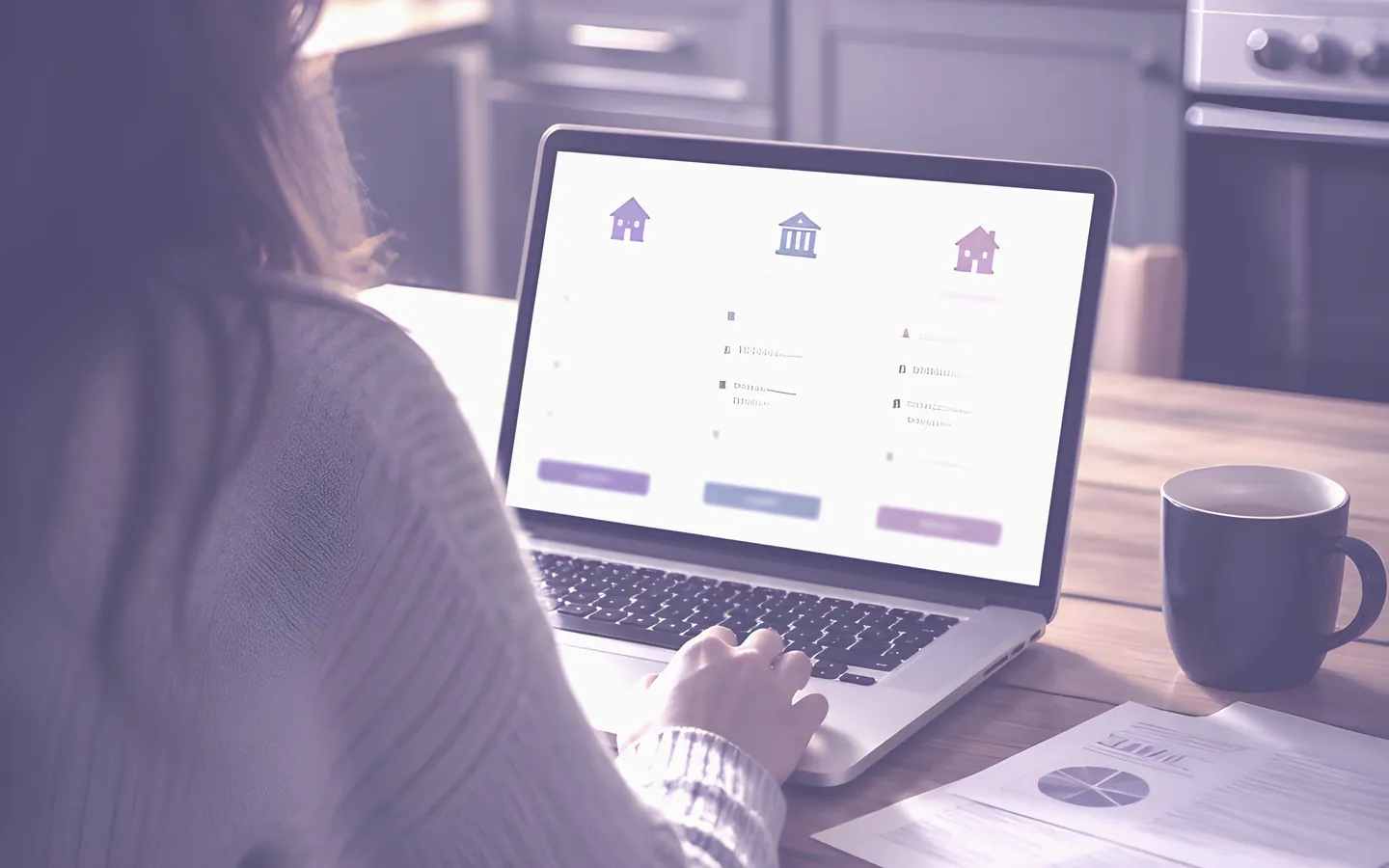 Person comparing loan options on a laptop